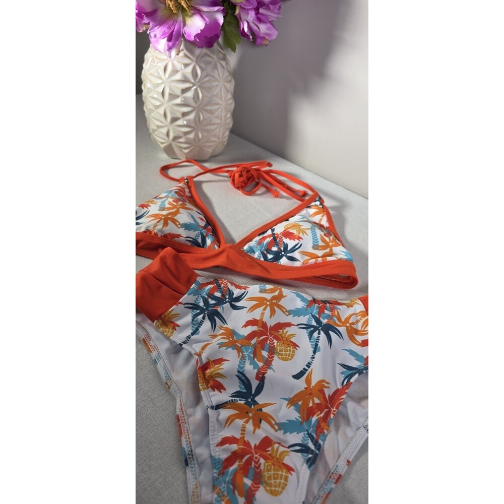 Two-piece Women’s Med Bikini set with a tropical palm tree and pineapple print.
